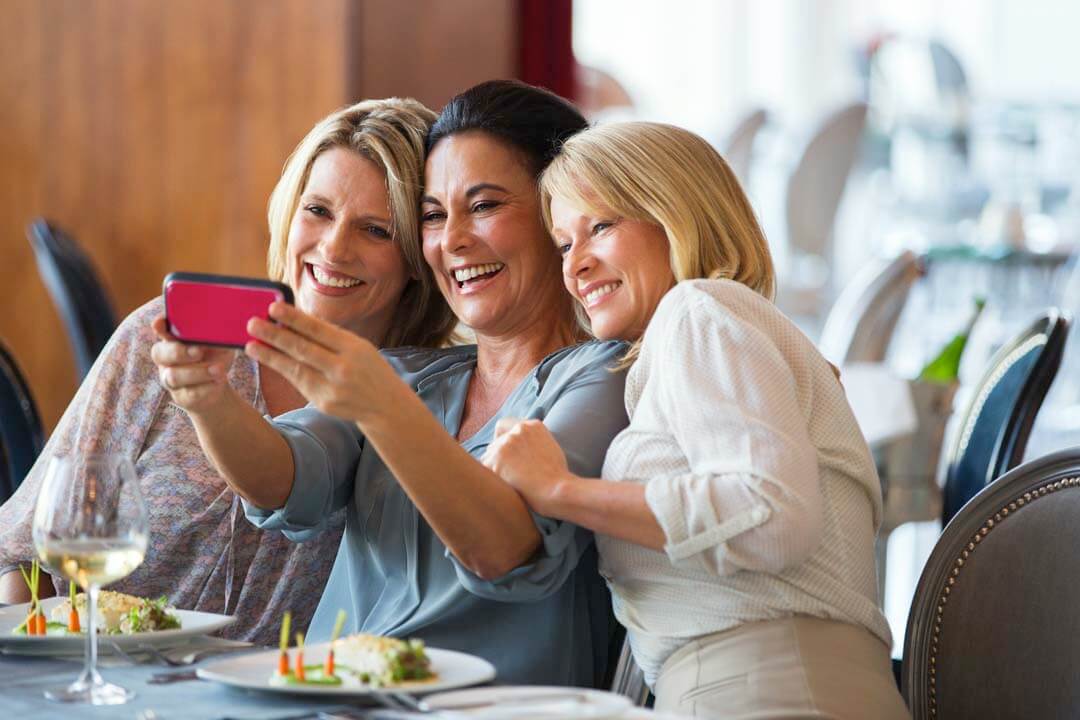 women taking selfie